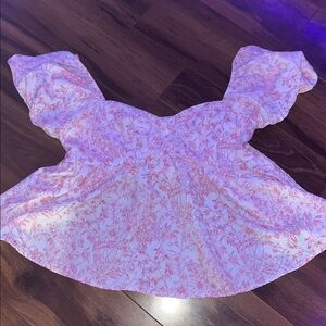 pink and white floral printed puffy shirt